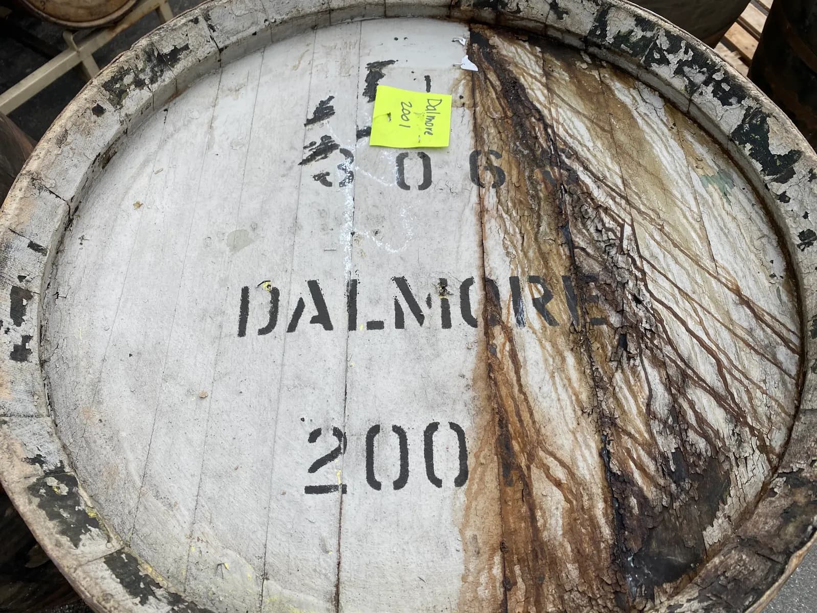 The end of a Dalmore cask filled in 2001, stencilled with the distillery name, cask number and fill year